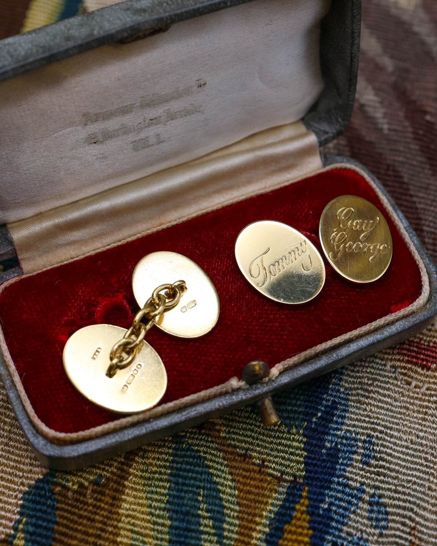 A fine pair of 18ct Yellow Gold Cuff Links, engraved "Gay George" & "Tommy" to one, and "Gay George" & "Peter" to the other. London Marks 1981. by Ramsden & Roed Ltd. Prov: Her Grace the late Duchess of Devonshire.