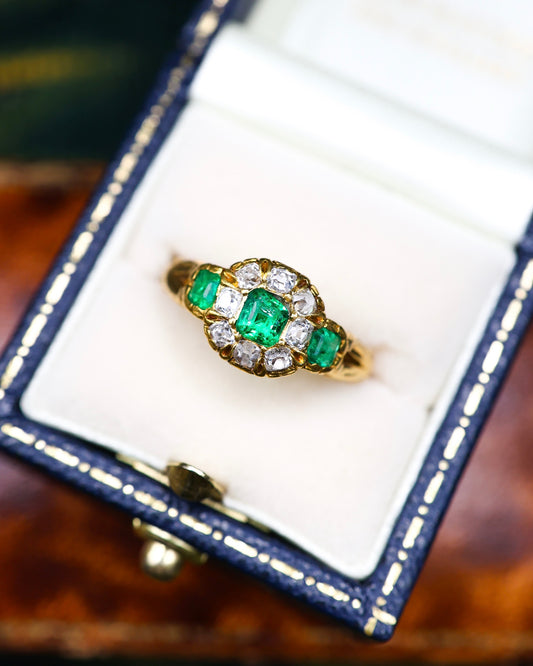 A very fine 15ct Yellow Gold (tested) Antique Emerald (3) and Diamond Ring, Circa 1860