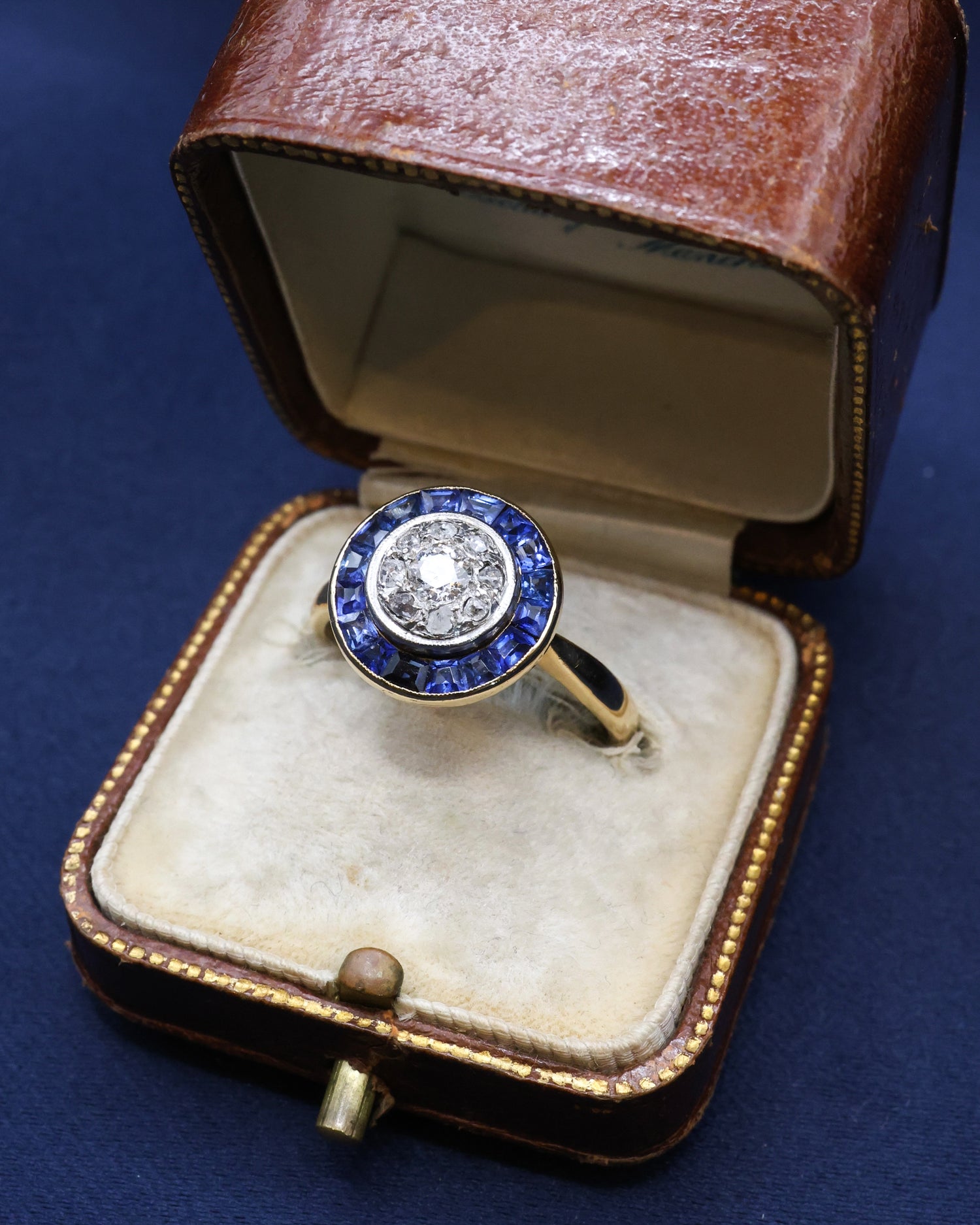 An 18ct Yellow Gold (tested), Platinum, Diamond & Sapphire Target Ring Circa 1925 - Robin Haydock Antique Jewellery
