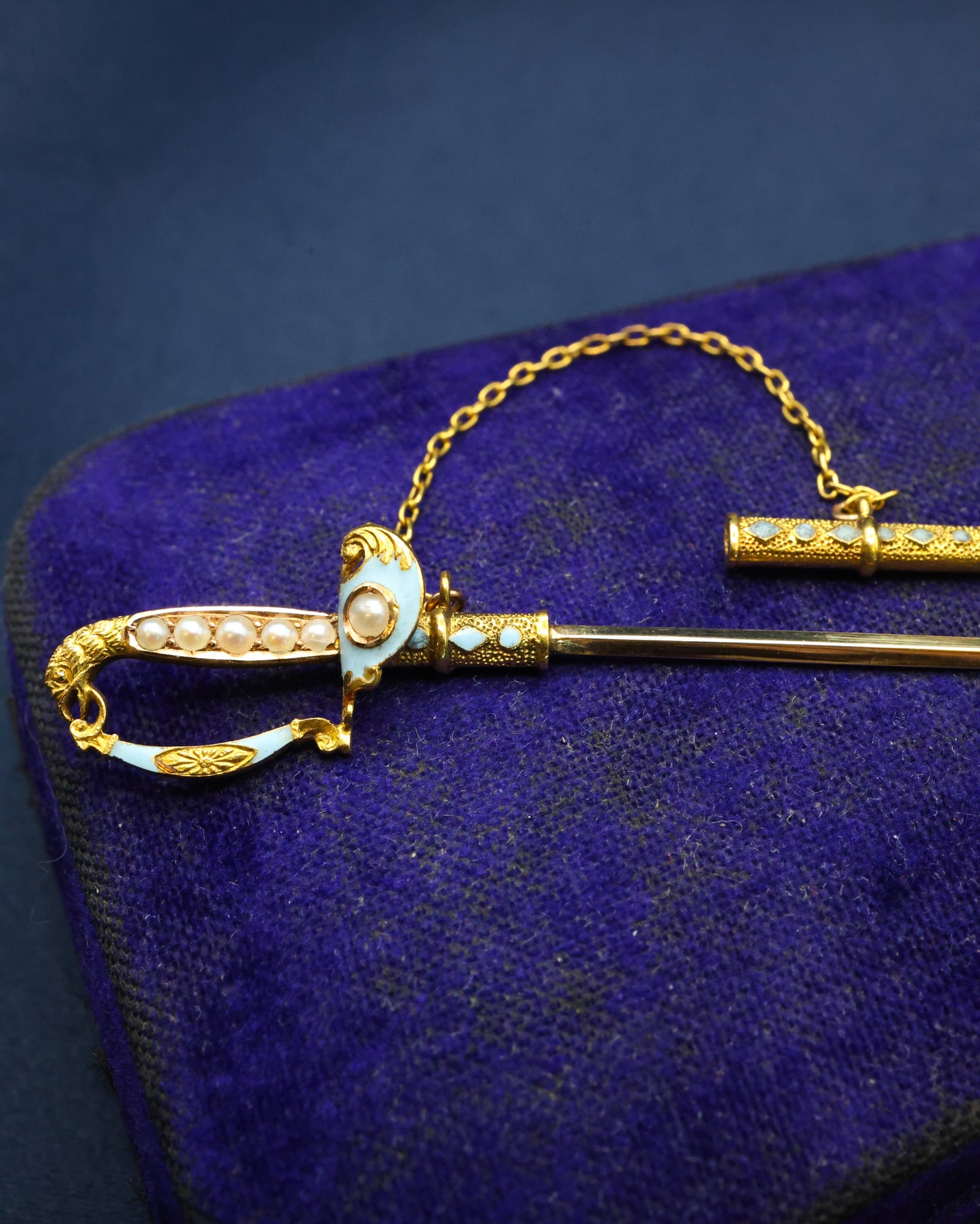 A very finely worked High Carat Yellow Gold Turquoise, Enamel & Pearl Sword Pin, with Eagles Head. Circa 1890 - Robin Haydock Antique Jewellery