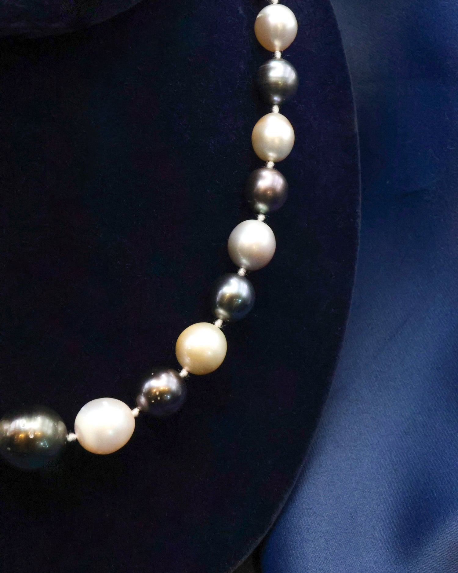 A Beautiful Dark and Light Grey to White Orient Graduated Cultured Pearl Necklace with an 18ct. White Gold (stamped), Spherical Clasp. Pre-Owned Circa 1990 - Robin Haydock Antique Jewellery