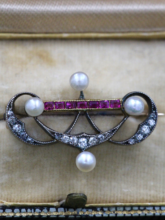 A very fine Victorian Pearl, Ruby and Diamond Brooch set in Silver tipped, High Carat Gold (tested), Circa 1880. - Robin Haydock Antiques