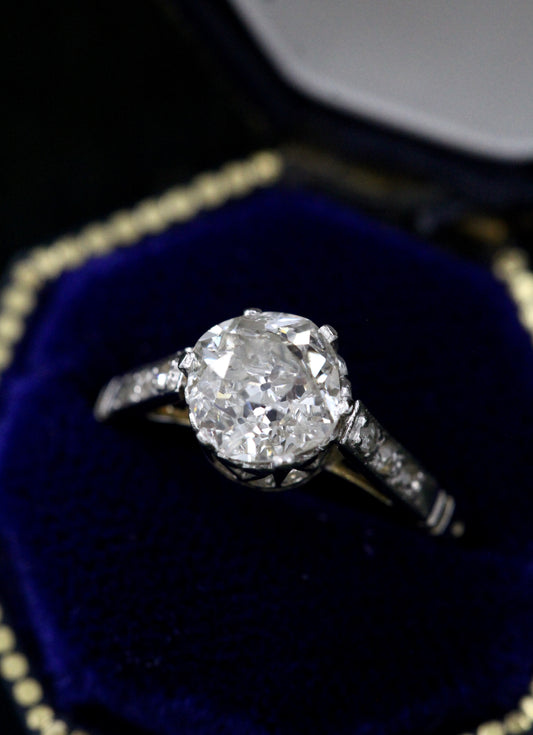 A very fine Platinum & 18 Carat Gold (tested), Old Cut Diamond Solitaire Ring, with Diamond Set Shoulders. Circa 1930. - Robin Haydock Antiques