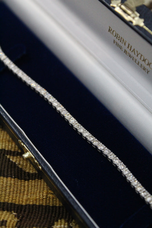 A very fine Diamond Line Bracelet in 18 Ct. White Gold, , with a Double Safety Catch. Pre Owned. - Robin Haydock Antiques