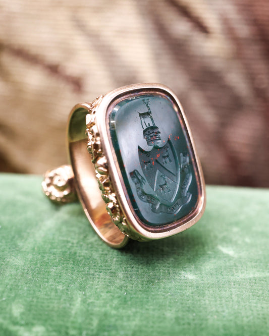 A Late Georgian 9ct Yellow Gold (tested), Seal, with foliate outline and a Bloodstone Antique Intaglio "Virtute  non Verbis".  Circa 1830 - Robin Haydock Antique Jewellery