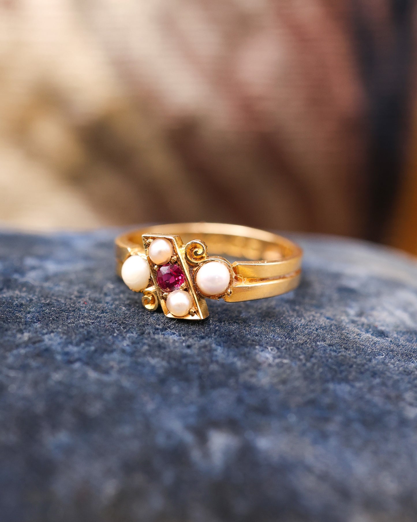 A stunning 18 Carat Yellow Gold Crossover Ring with Ruby and Pearls