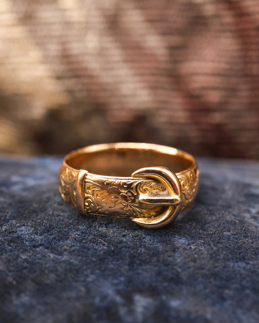 A very fine 18 carat Yellow Gold Buckle Ring, with a finely hand-engraved floral relief to the upper section. English. Hallmarks C.1897 - Robin Haydock Antique Jewellery