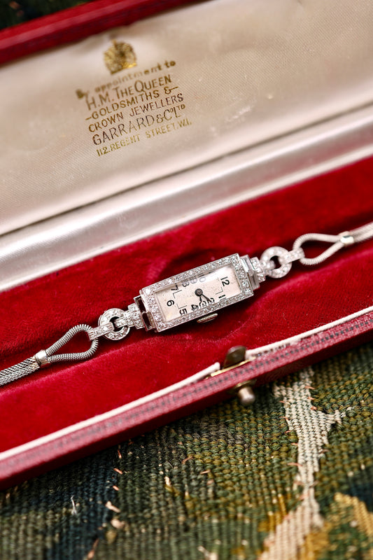 A very fine oblong "Art Deco" Diamond set Cocktail Watch in Platinum & 18ct White Gold (tested) with Diamond Step shoulders. Circa 1930 - Robin Haydock Antiques