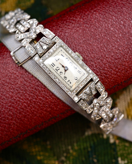 A very fine Platinum (tested), Art Deco Diamond Cocktail Watch with a Diamond set Half-Bracelet. Circa 1930. - Robin Haydock Antiques