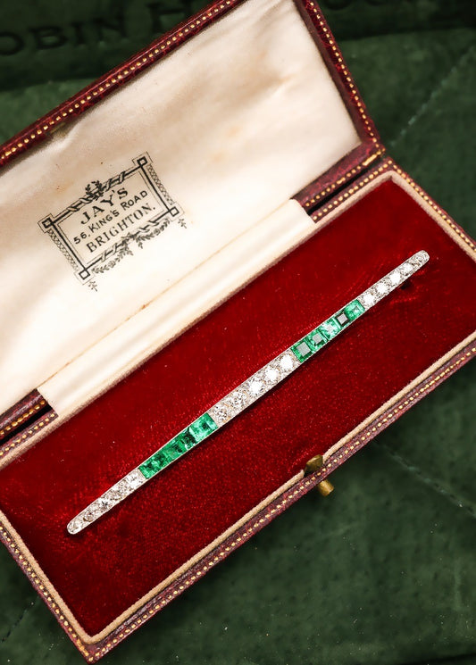 A very fine Emerald and Diamond Antique Brooch of bar design, mounted in Gold & Platinum.  English Circa 1920 - Robin Haydock Antiques