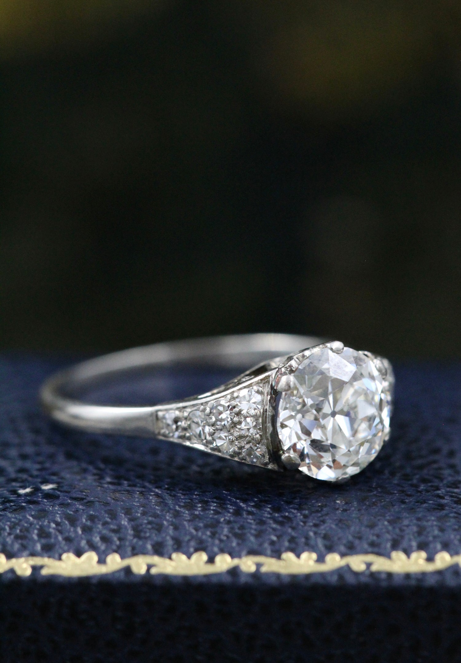 A very fine Platinum & Diamond Solitaire Ring, set with an Old European Cut Diamond, of 2.18 Carats, G Colour and SI1 Clarity. Offset by graduated Diamond Shoulders. Circa 1925 - Robin Haydock Antiques