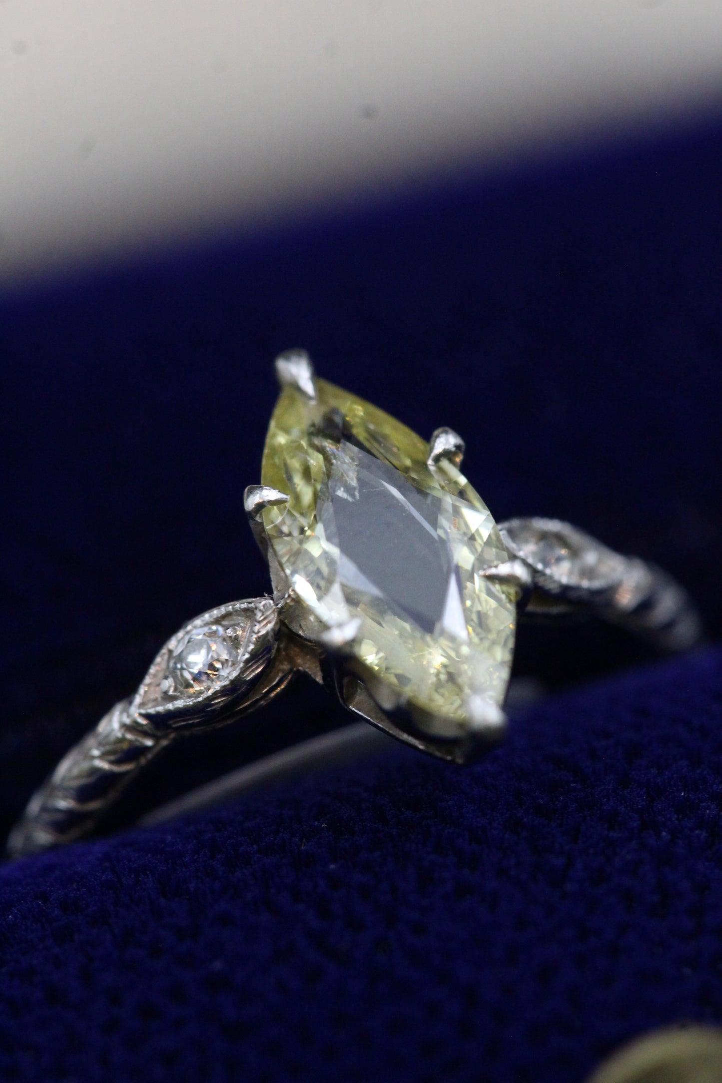 An excellent Platinum (tested) Marquise Shaped Natural and Untreated Fancy Yellow Diamond Solitaire Ring. Circa 1930. - Robin Haydock Antiques