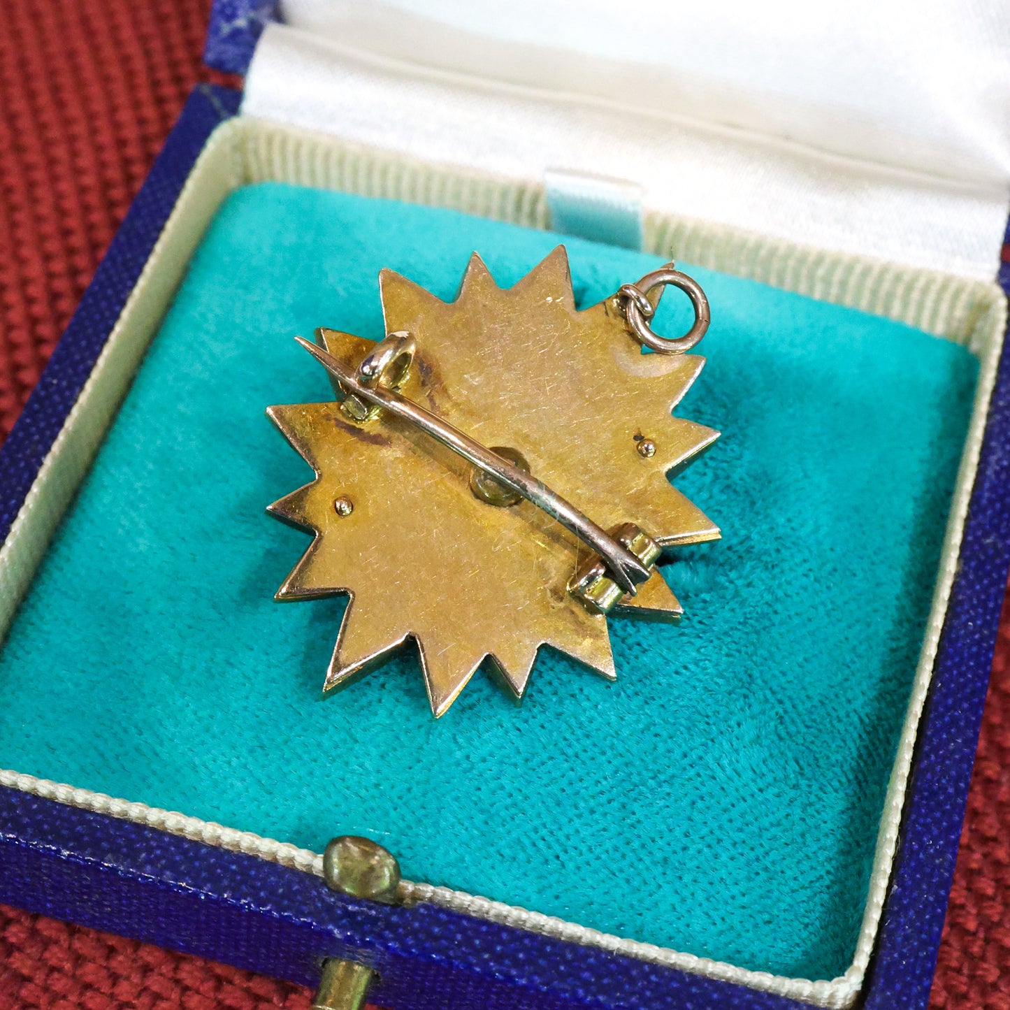 A very beautiful High Carat Gold (tested), Diamond &  Natural Pearl Star Pendant / Brooch with Blue Enamel Highlights Circa 1880