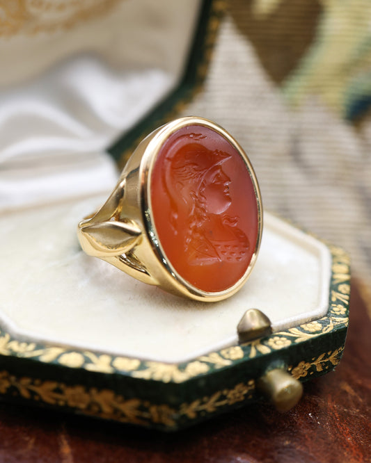 An unusually heavy 18ct Yellow Gold (tested), Oval Carnelian Intaglio ring, finely carved with the image of a warrior wearing a Winged Helmet (Hermes - Mercury), partial hallmarks. English. Circa 1890