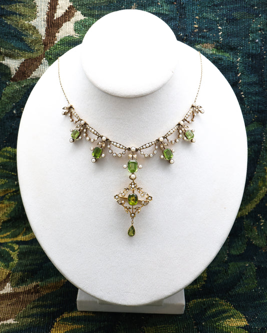 An exquisite Peridot & Seed Pearl Festoon Necklace with a matching Quatrefoil style detachable Pendant/Brooch in 15 Carat Yellow Gold, English, Circa 1900 - Robin Haydock Antique Jewellery