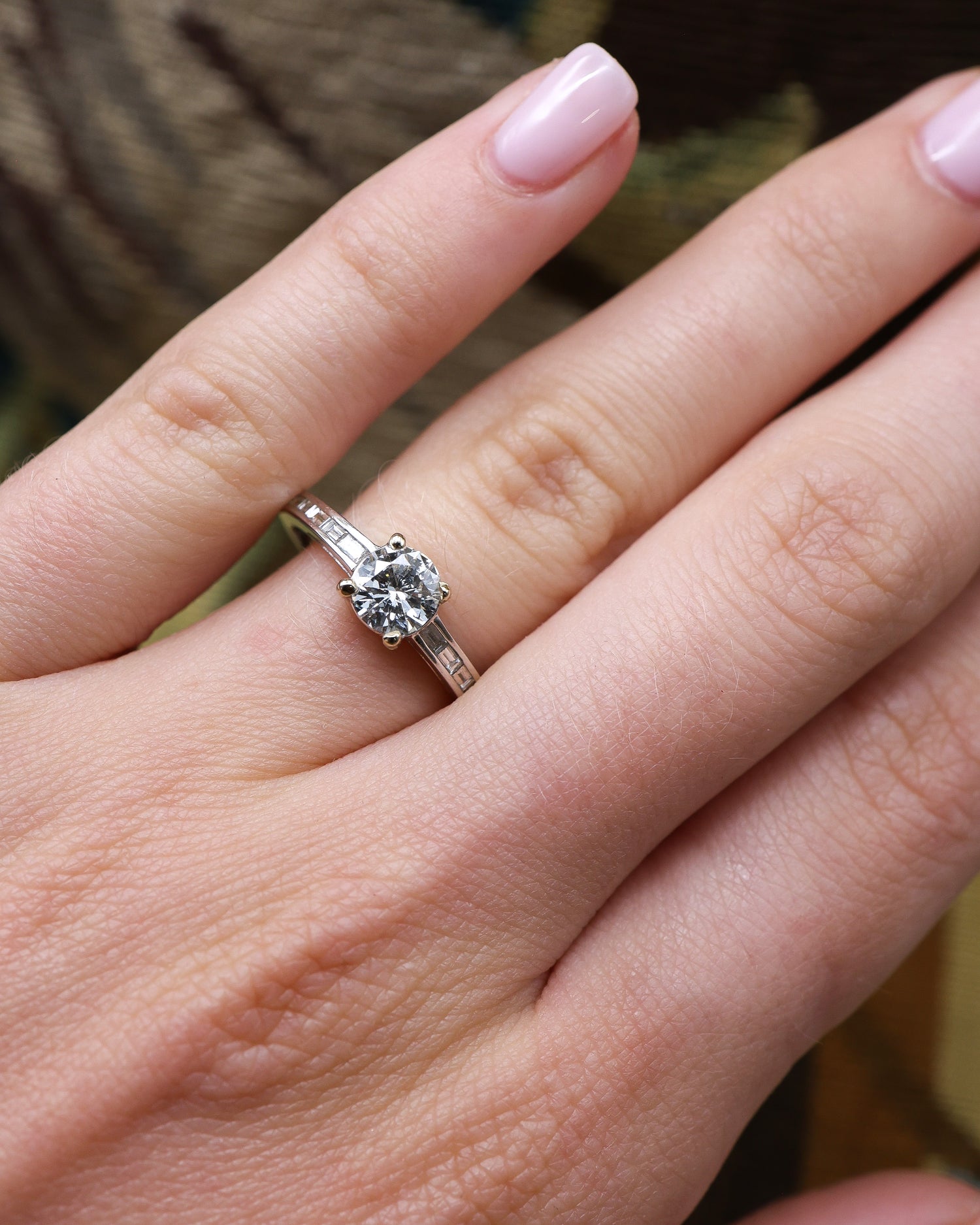 A very fine 18 ct White Gold Diamond  Solitaire Ring, 0.66 Carats Approximately, with shoulder settings of 0.18 Carats (stamped) of Modified Step Cut Diamonds.  Preowned - Robin Haydock Antique Jewellery
