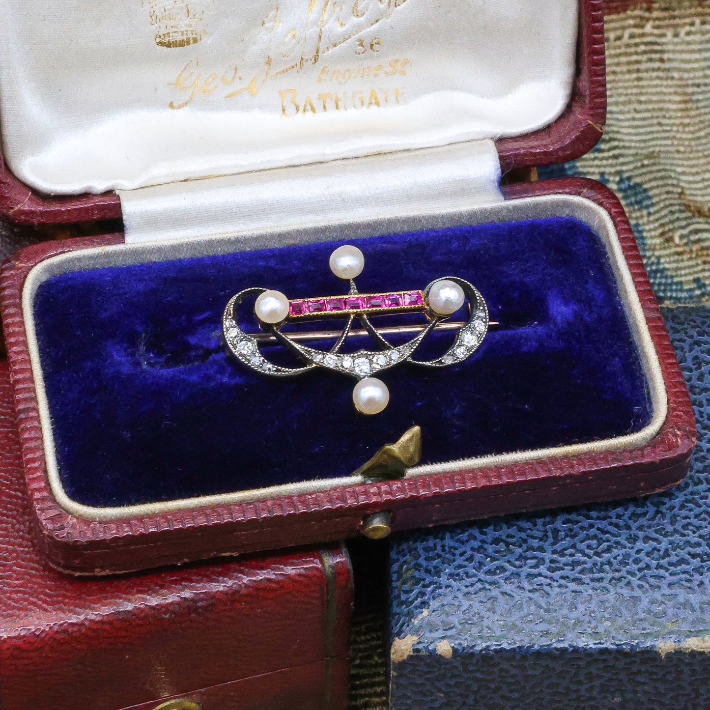 A very fine Antique Victorian Pearl, Ruby and Diamond Brooch set in Silver tipped, High Carat Gold (tested), Circa 1880. - Robin Haydock Antique Jewellery