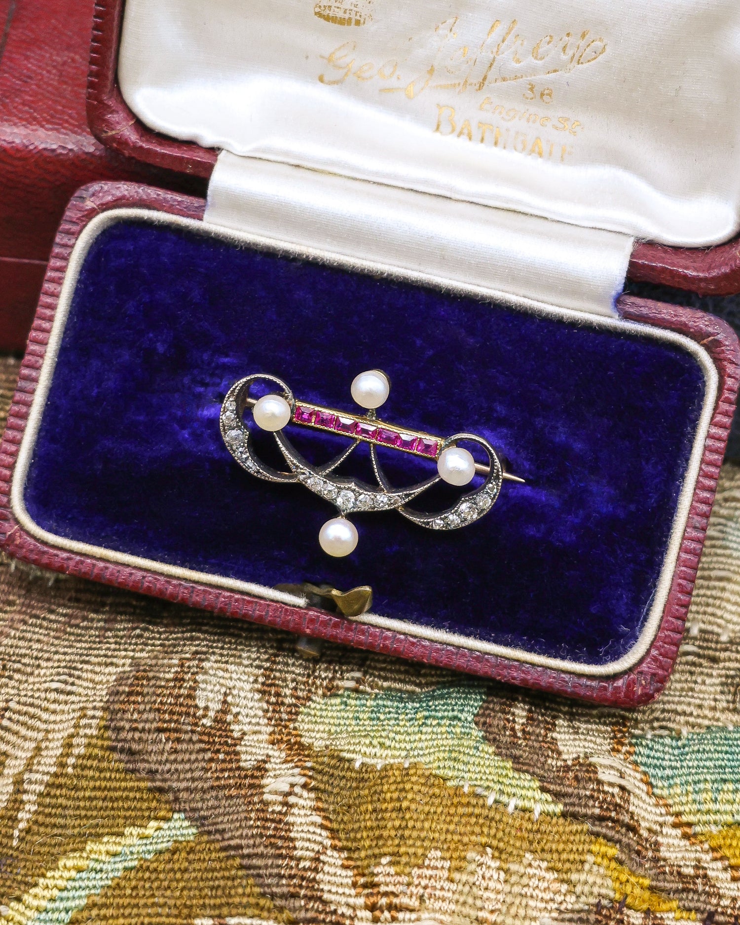 A very fine Antique Victorian Pearl, Ruby and Diamond Brooch set in Silver tipped, High Carat Gold (tested), Circa 1880. - Robin Haydock Antique Jewellery