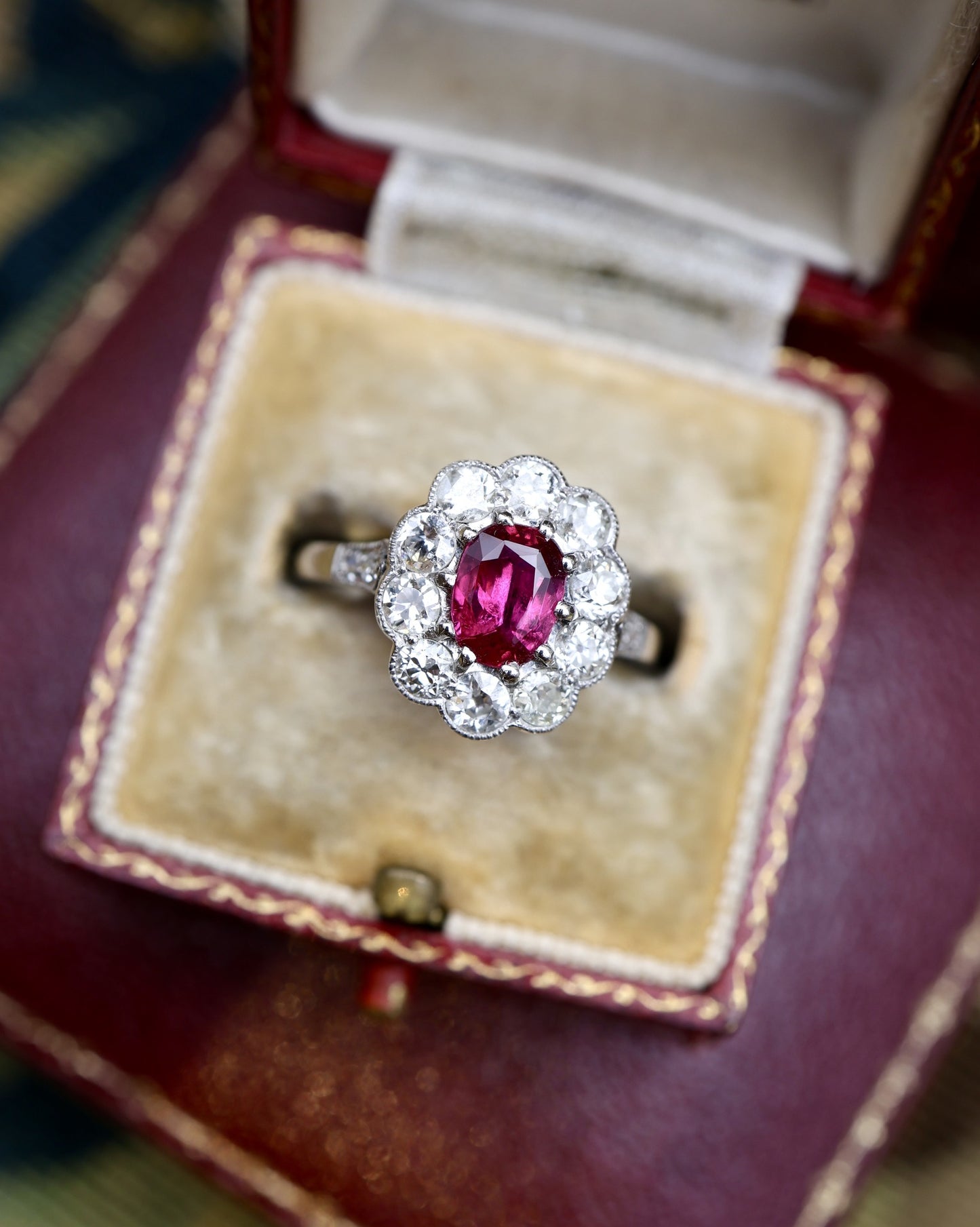 A very fine Siamese Ruby & Diamond Cluster Ring mounted in Platinum, English, Circa 1930