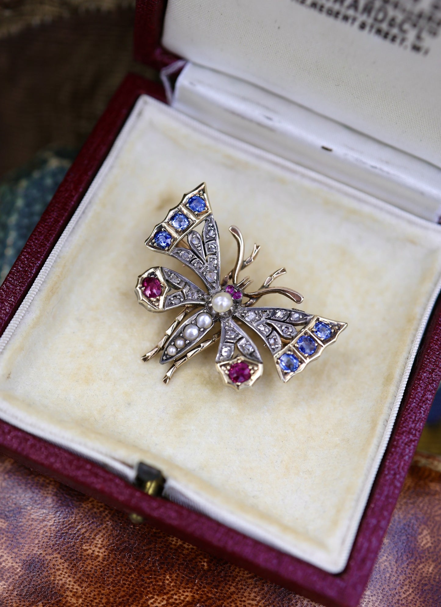 A very fine Antique High Carat Yellow Gold  (tested) Victorian Diamond, Natural Sapphire & Ruby Butterfly Pendant Brooch Circa 1880