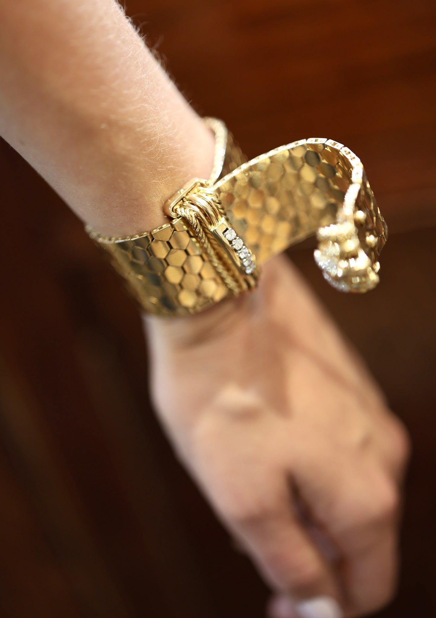 A very fine 18 carat Yellow Gold, 122.68 g. Tassel Cuff (Bracelet), with Diamonds. French. Circa 1940.