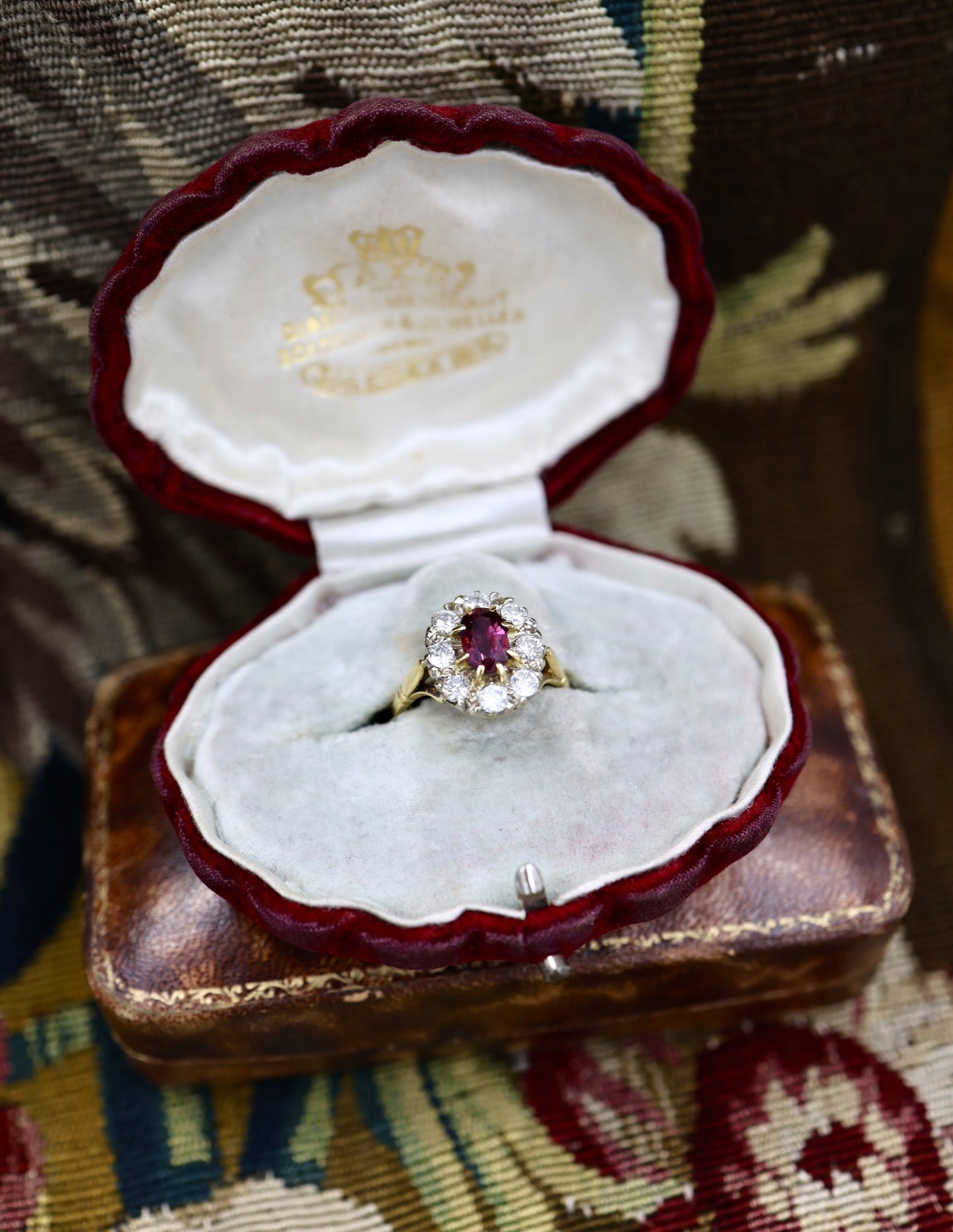 A very fine 18ct Yellow & White Gold Oval 1.35 Carat Siam Ruby & Diamond Cluster Ring. Circa 1975