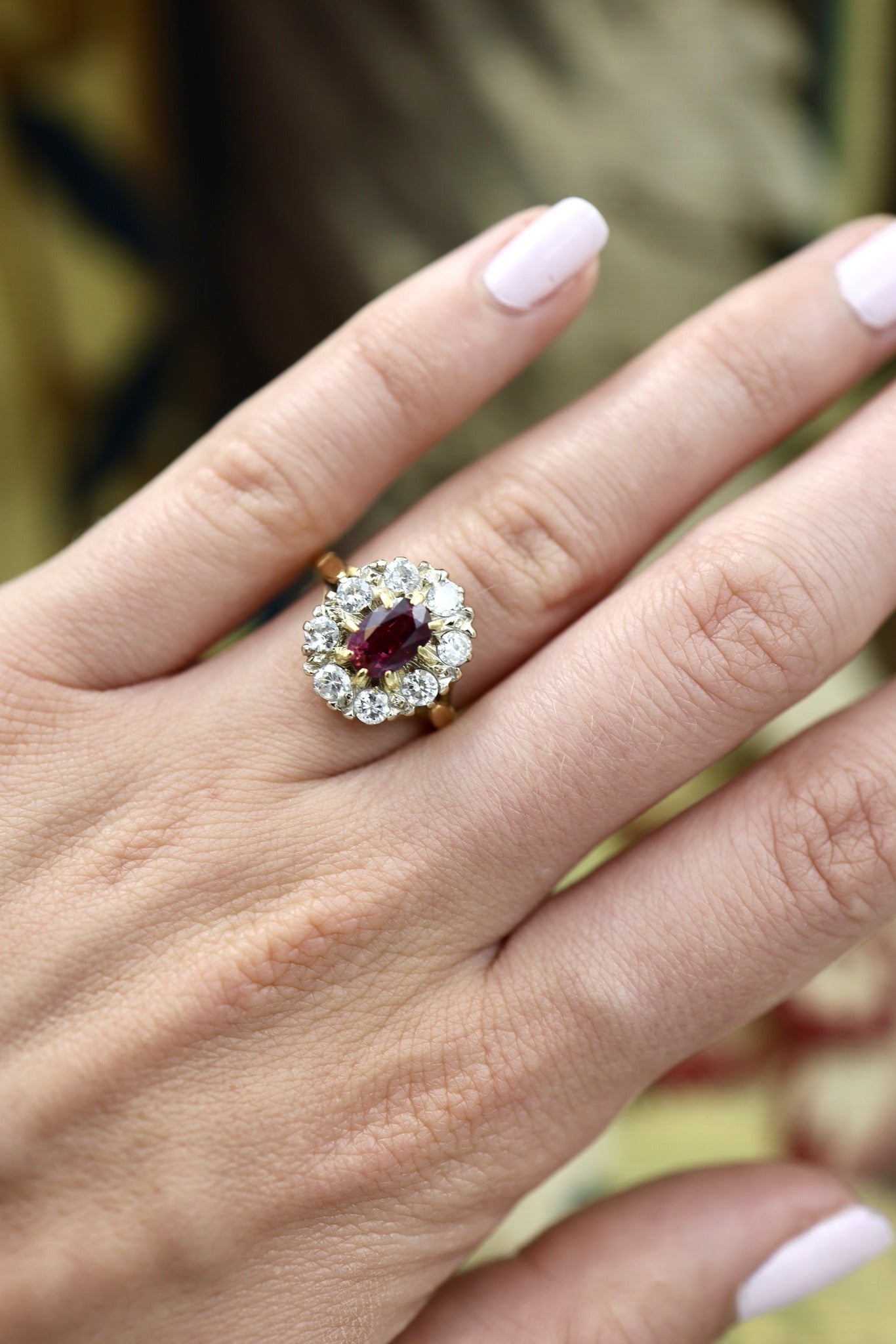 A very fine 18ct Yellow & White Gold Oval 1.35 Carat Siam Ruby & Diamond Cluster Ring. Circa 1975