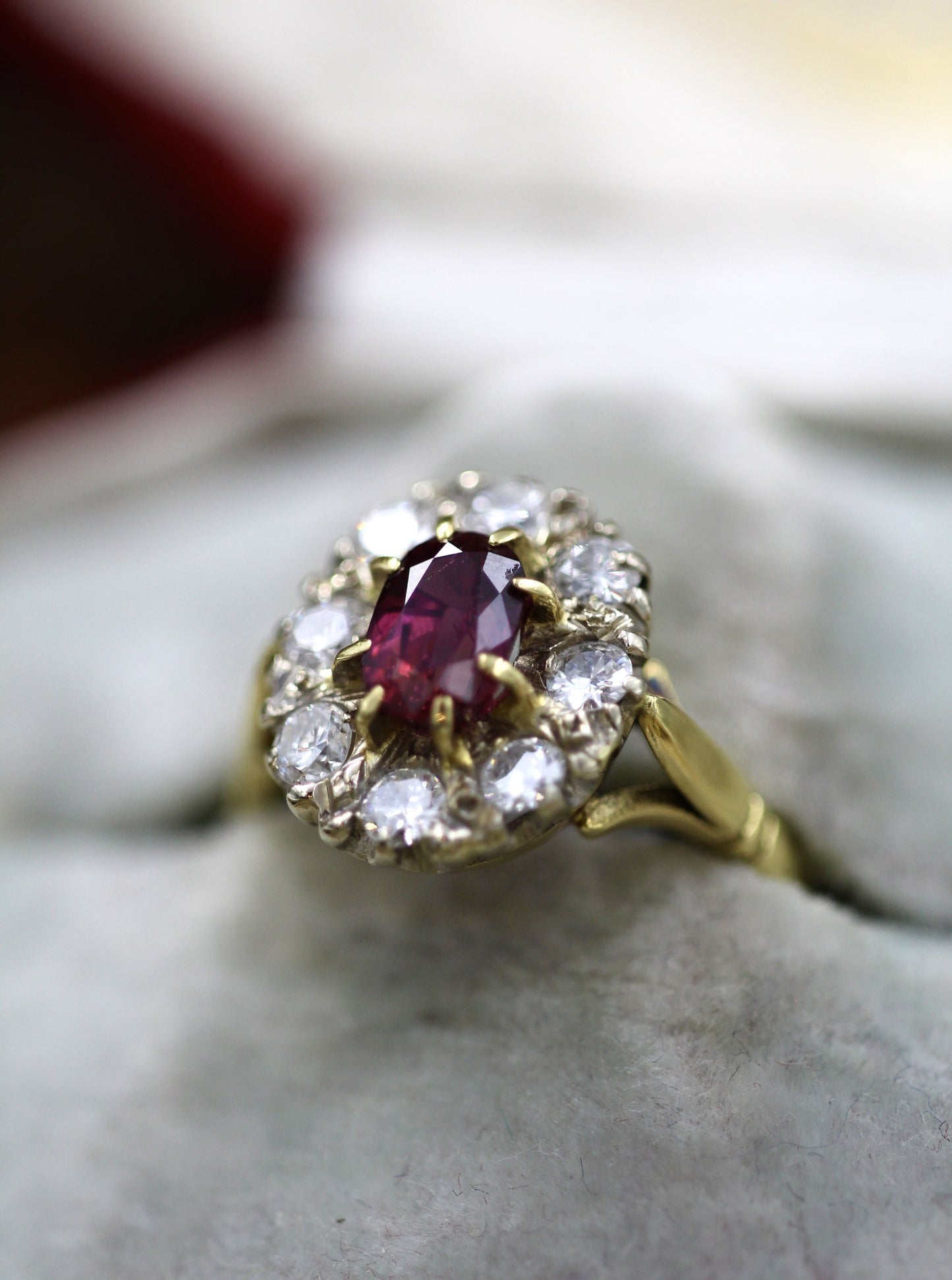 A very fine 18ct Yellow & White Gold Oval 1.35 Carat Siam Ruby & Diamond Cluster Ring. Circa 1975