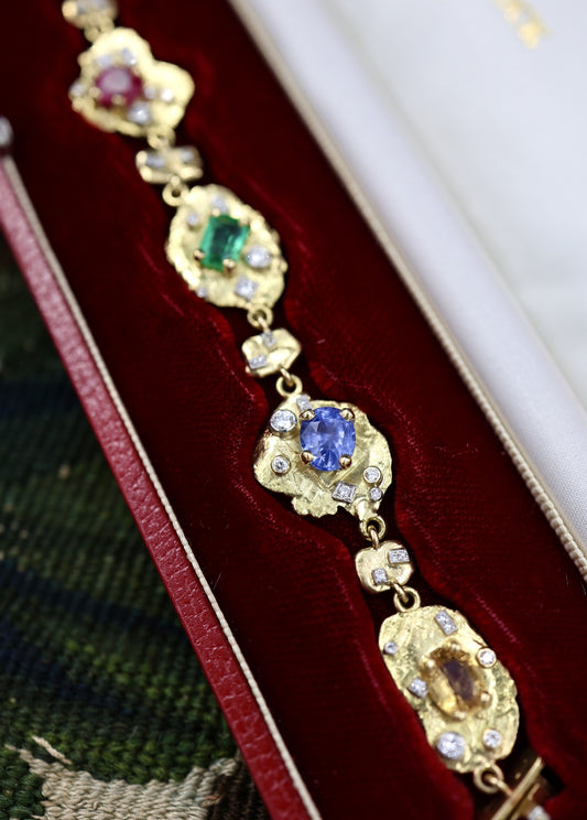 A very unusual Multi-Gem & Diamond, Yellow & White 18ct. Gold (tested), Acrostic Bracelet, Representing DEAREST. Circa 1970. - Robin Haydock Antiques