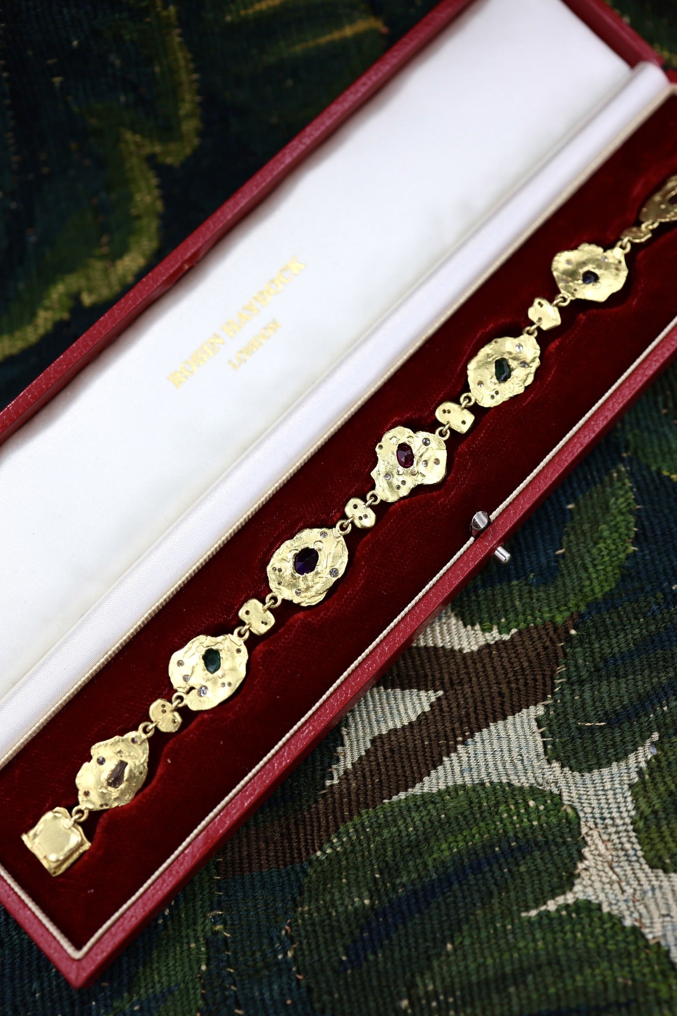 A very unusual Multi-Gem & Diamond, Yellow & White 18ct. Gold (tested), Acrostic Bracelet, Representing DEAREST. Circa 1970.