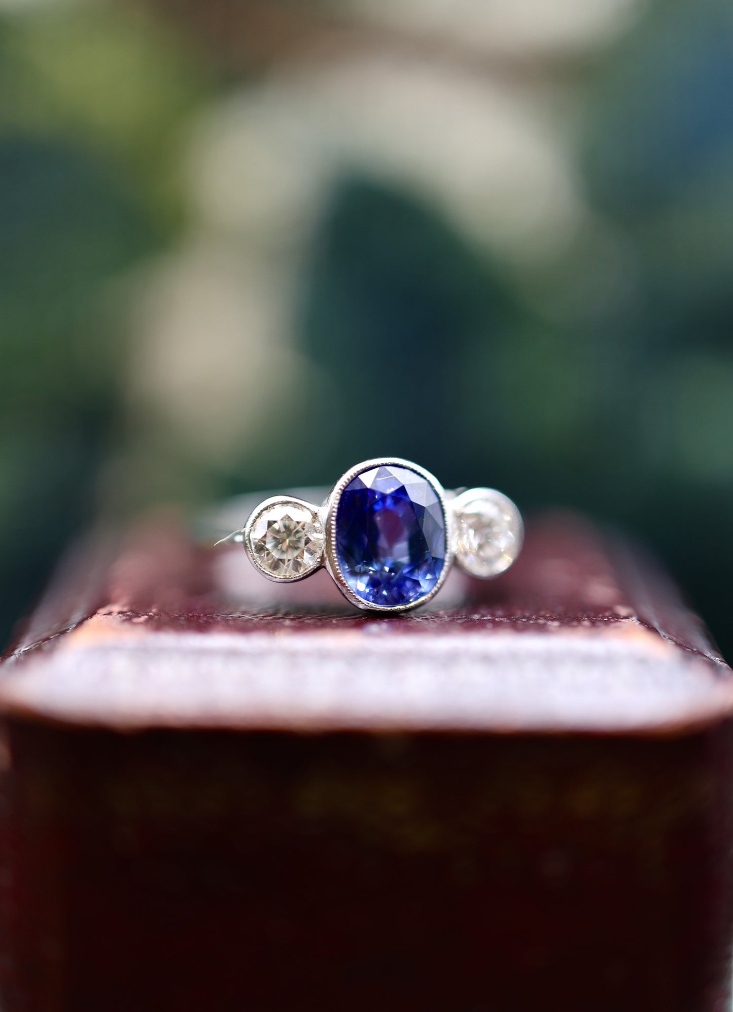 A very fine 18 ct.  White Gold & Platinum Oval 2.40ct Sapphire & Diamond Three Stone Ring. Circa 1935