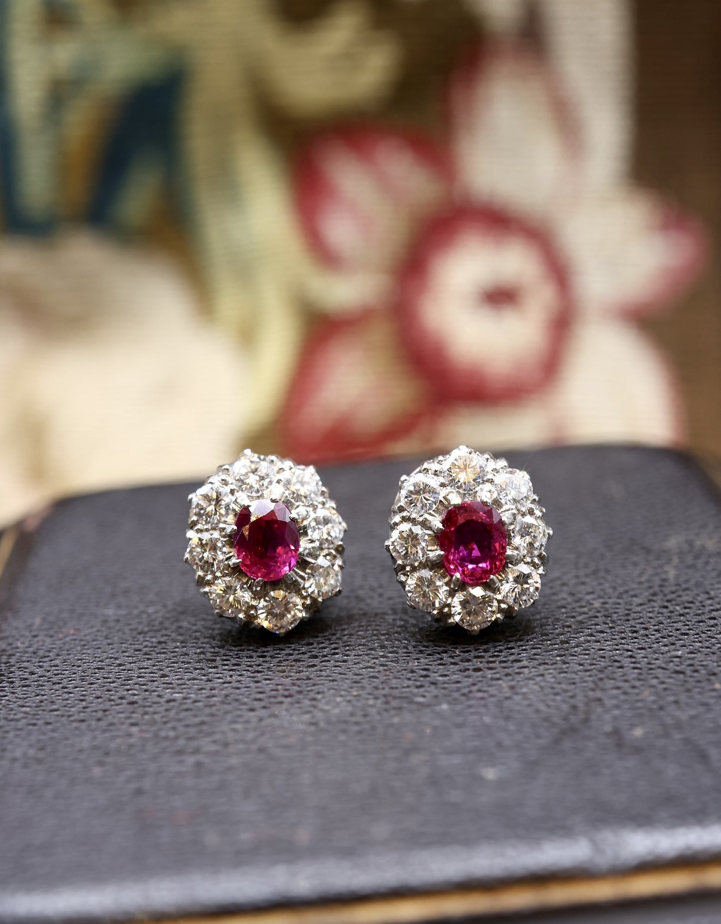 A pair of Vintage Natural Burma Ruby and Diamond Cluster Earrings in Platinum and 18ct White Gold, Circa 1950