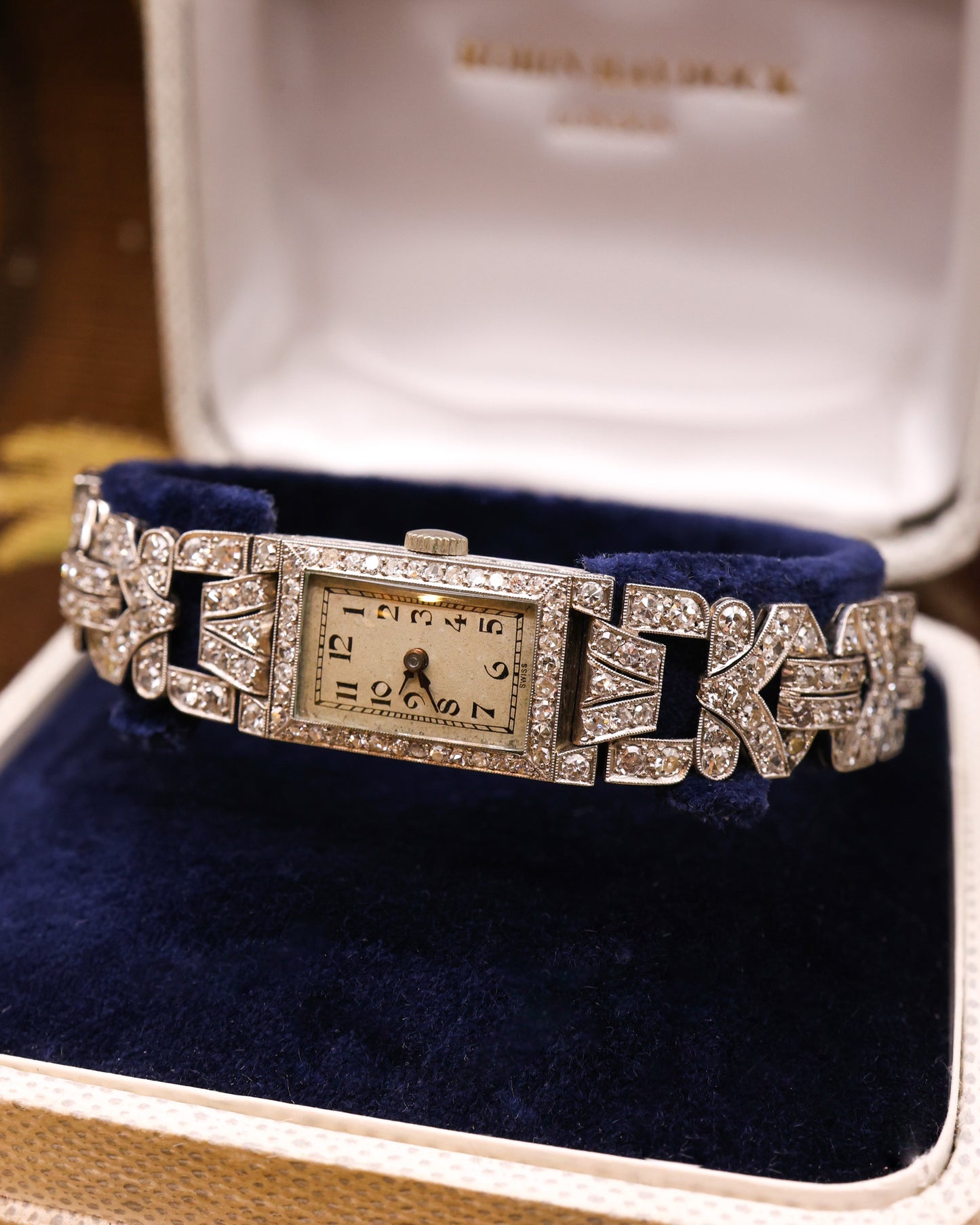 A very fine Platinum (tested), Vintage Art Deco Diamond Cocktail Watch with a Diamond set Half-Bracelet. Circa 1930.