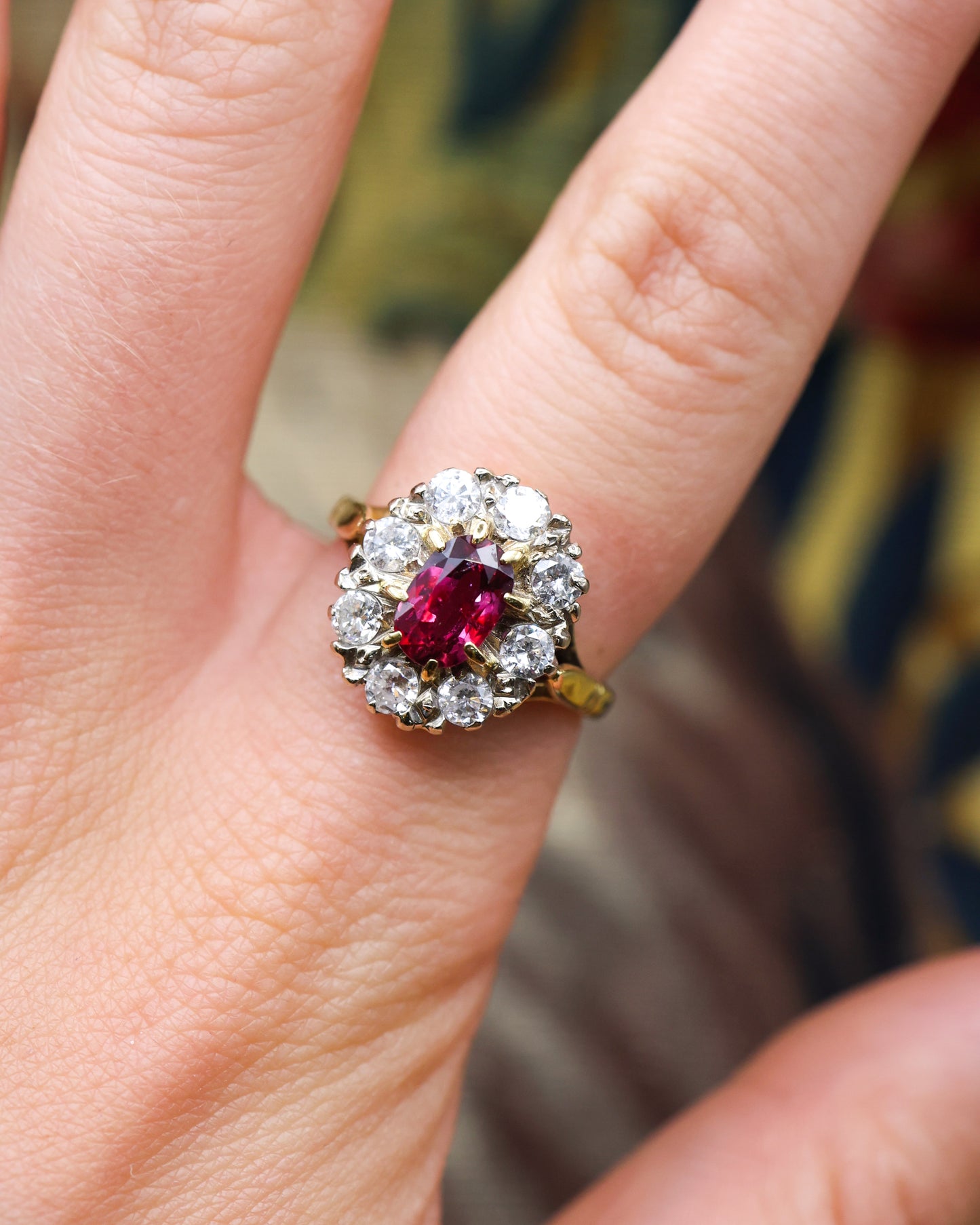 A very fine 18ct Yellow & White Gold Oval 1.35 Carat Siam Ruby & Diamond Cluster Ring. Circa 1975