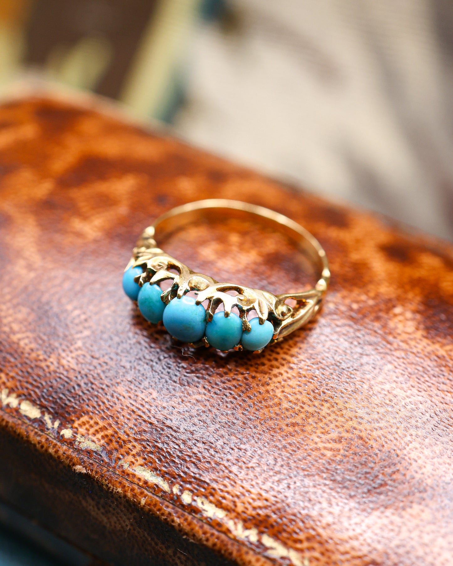 A very fine 15 carat (tested ) Yellow Gold, five stone Turquoise Carved Ring.  English. Circa 1890.