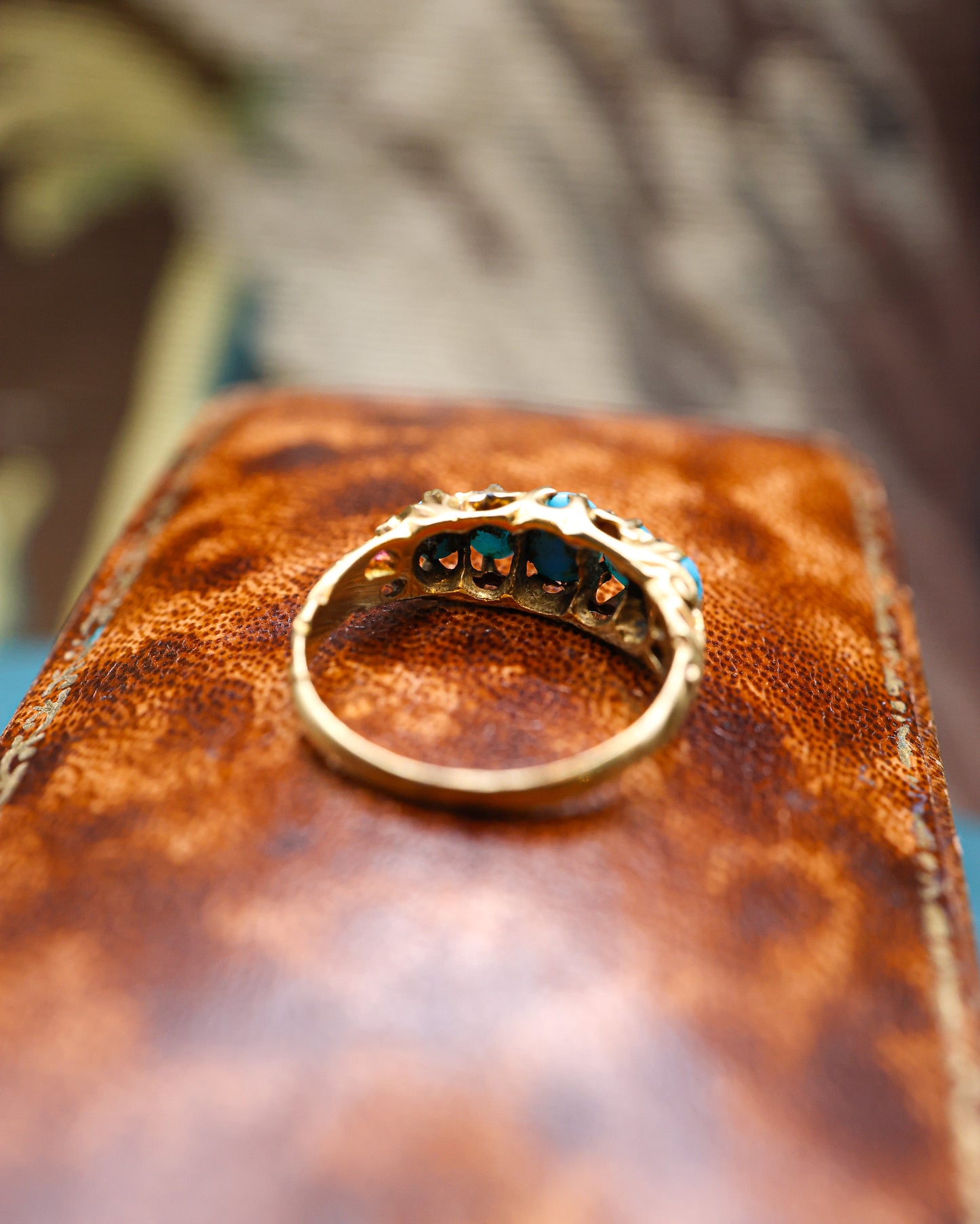 A very fine 15 carat (tested ) Yellow Gold, five stone Turquoise Carved Ring.  English. Circa 1890.