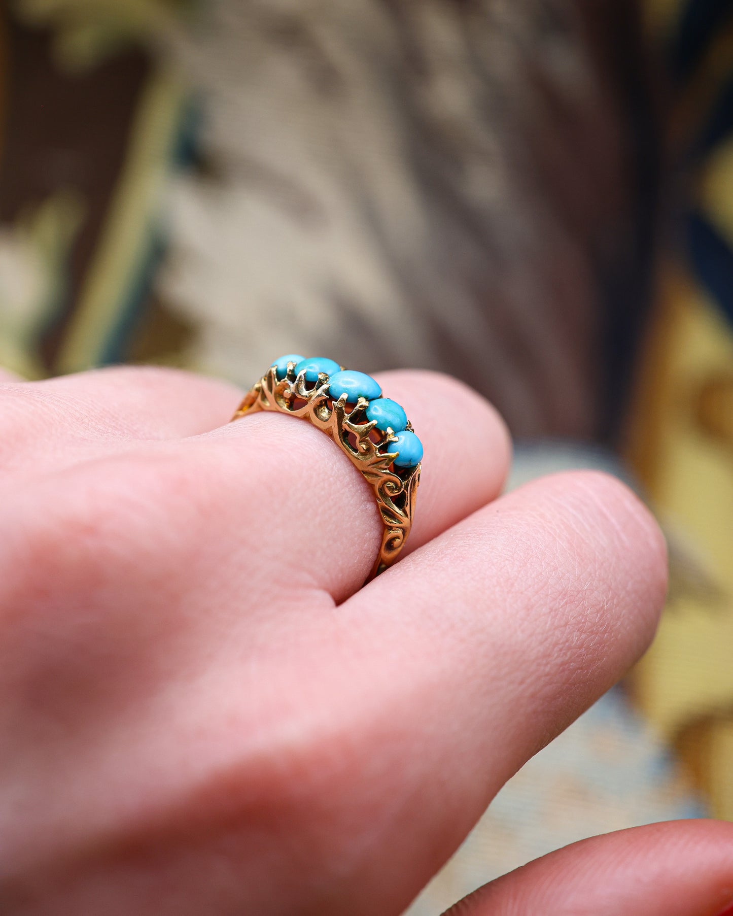 A very fine 15 carat (tested ) Yellow Gold, five stone Turquoise Carved Ring.  English. Circa 1890.