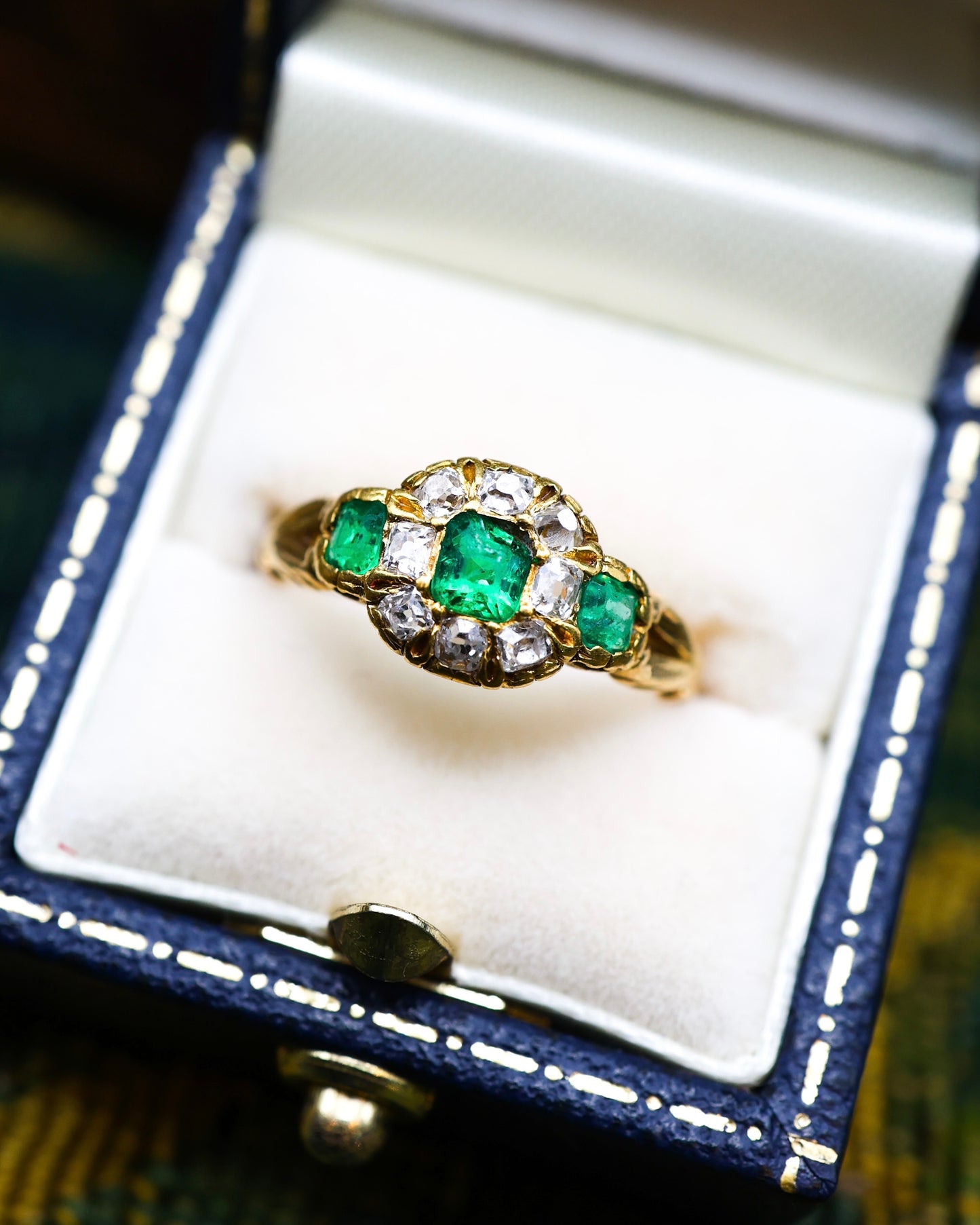 A very fine 15ct Yellow Gold (tested) Antique Emerald (3) and Diamond Ring, Circa 1860