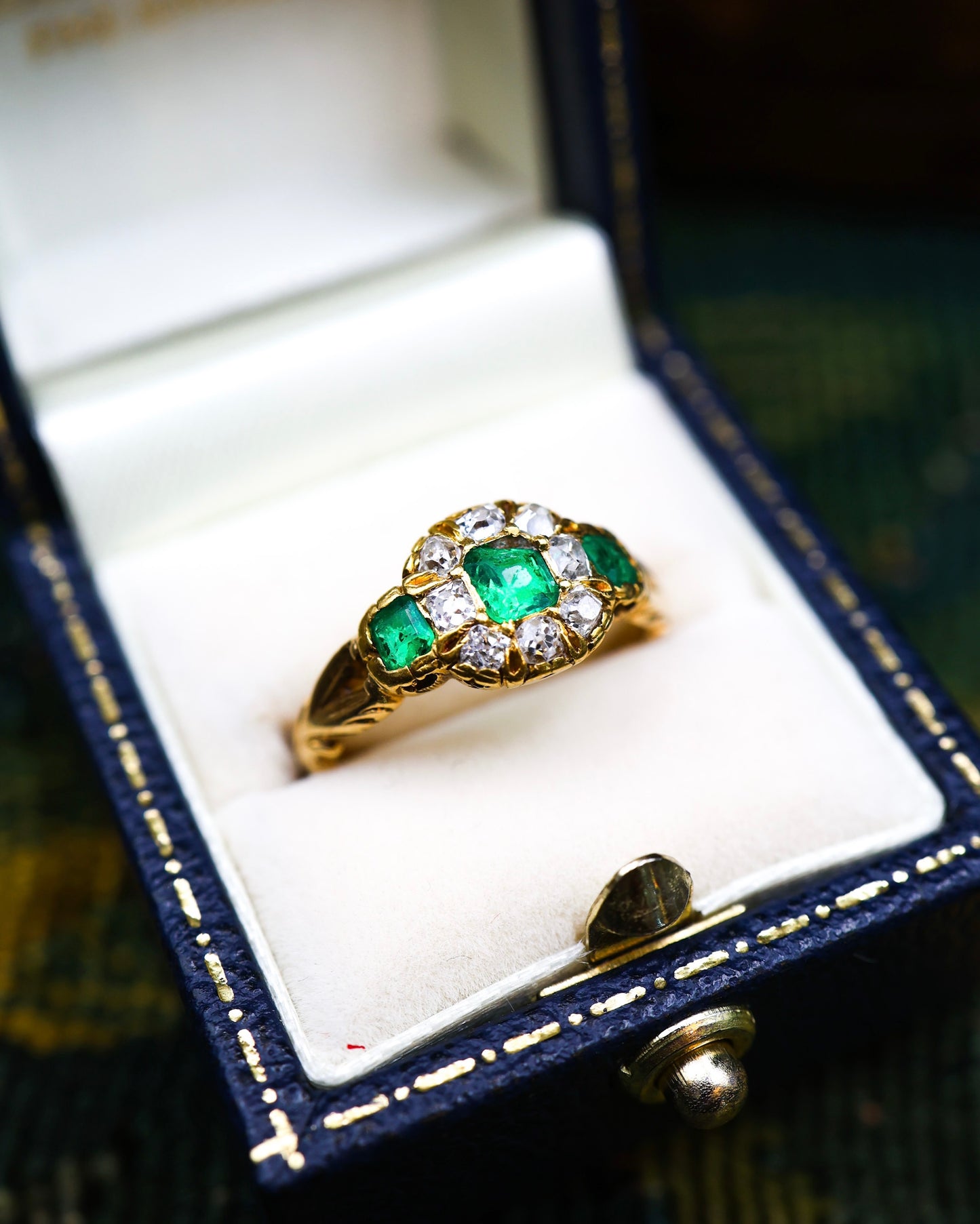 A very fine 15ct Yellow Gold (tested) Antique Emerald (3) and Diamond Ring, Circa 1860