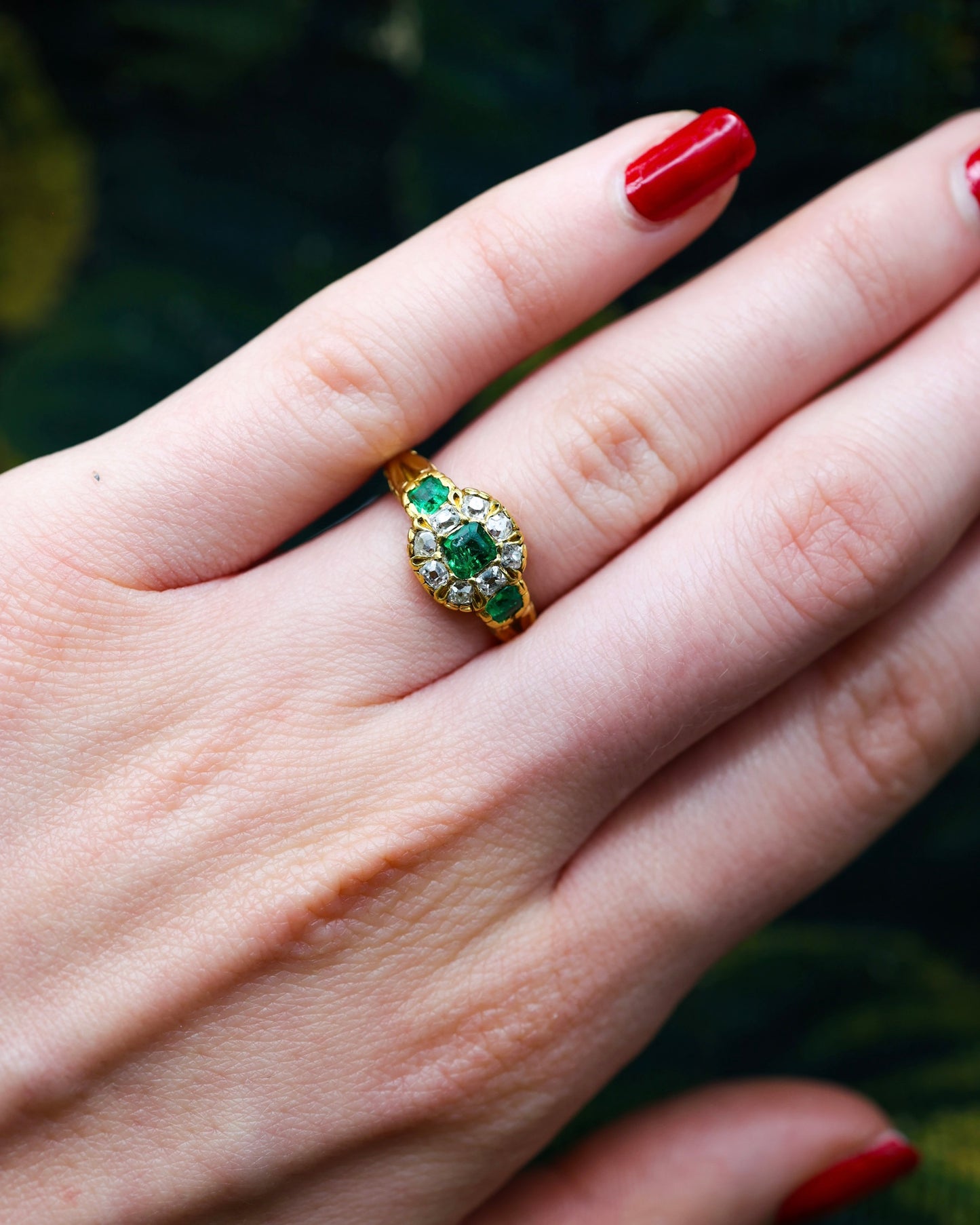 A very fine 15ct Yellow Gold (tested) Antique Emerald (3) and Diamond Ring, Circa 1860