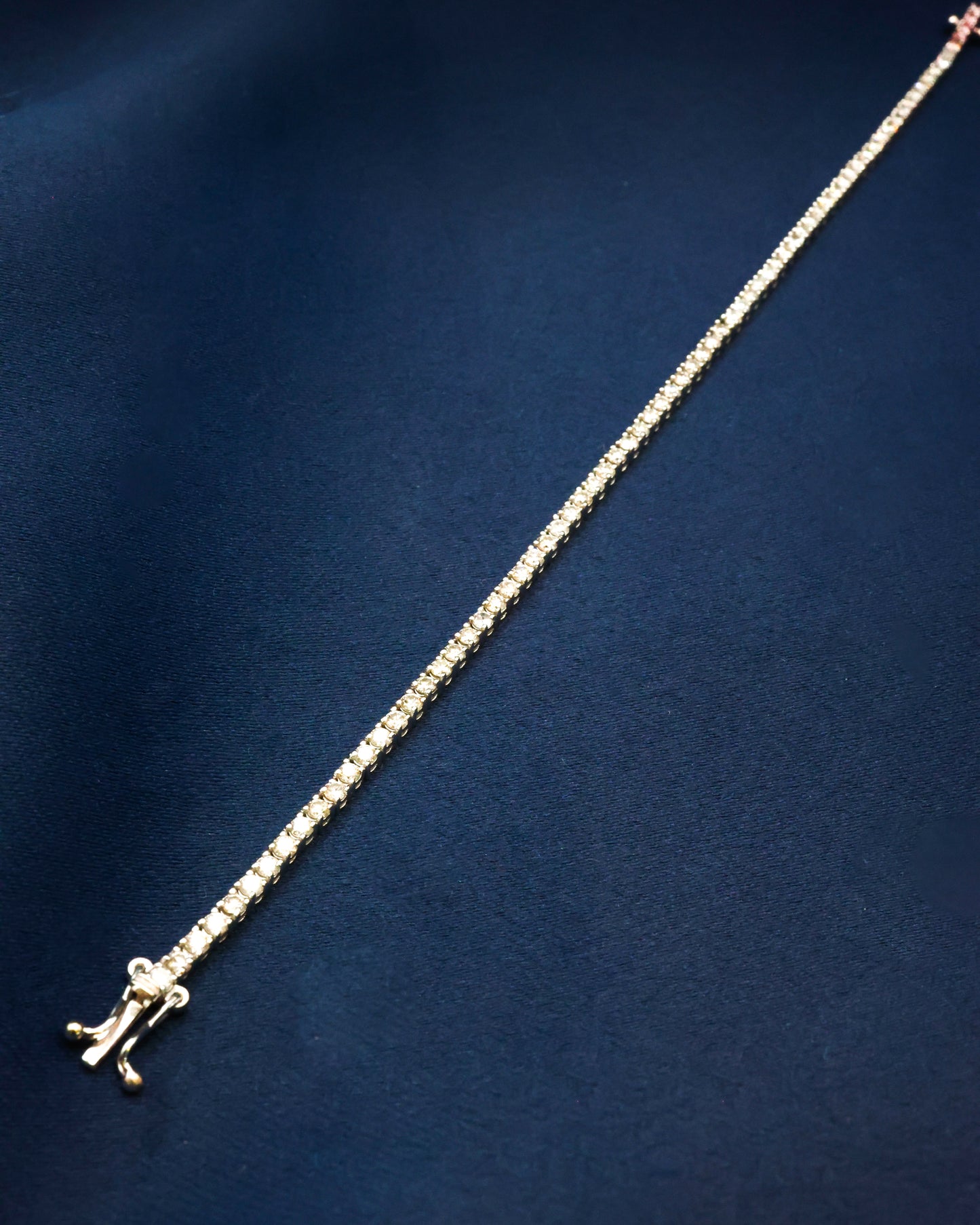 One very fine Diamond Line Bracelet set in 18ct. White Gold, assessed as approximately 2.25 Carats (un-weighed) and of I- J Colour and VS - SI Clarity. Pre-owned. - Robin Haydock Antique Jewellery