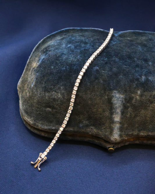 One very fine Diamond Line Bracelet set in 18ct. White Gold, assessed as approximately 2.25 Carats (un-weighed) and of I- J Colour and VS - SI Clarity. Pre-owned. - Robin Haydock Antique Jewellery