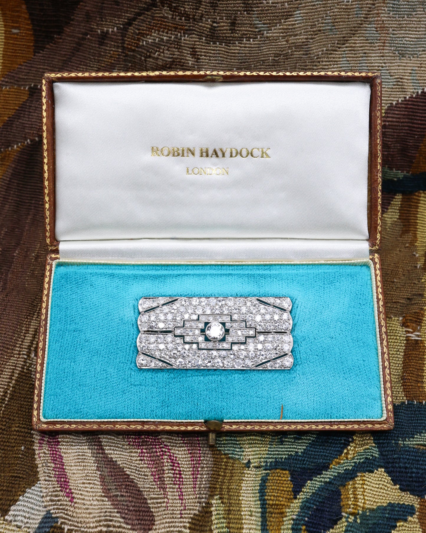 A very fine, Art Deco, Platinum & 15ct White Gold (tested), 4.55 Carat Diamond Plaque Brooch with open strap work. English Circa 1930.