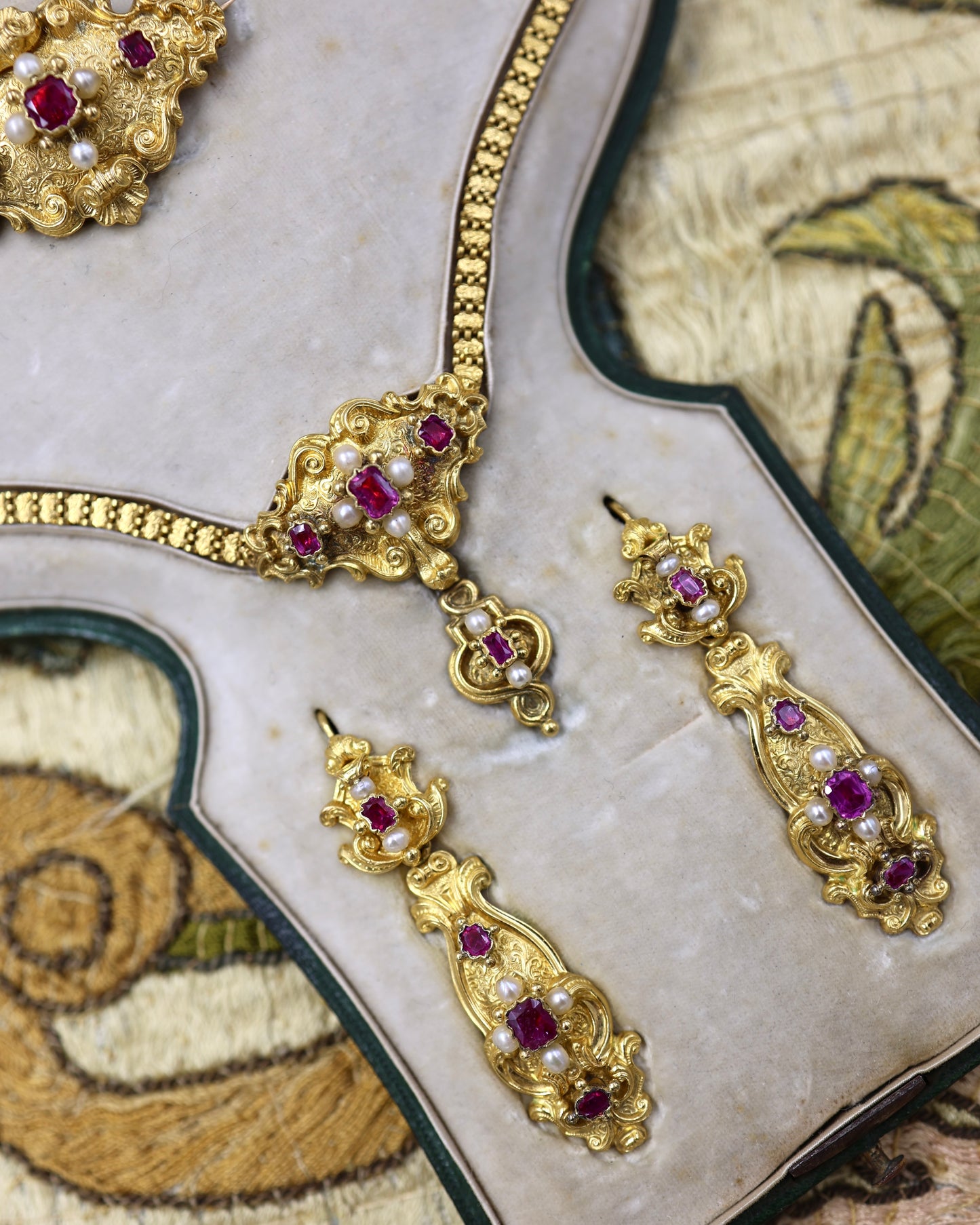 A Beautiful example of a very fine Antique 18ct Yellow Gold, Untreated Burmese Ruby and Seed Pearl, French Parure in the original box. Circa 1825