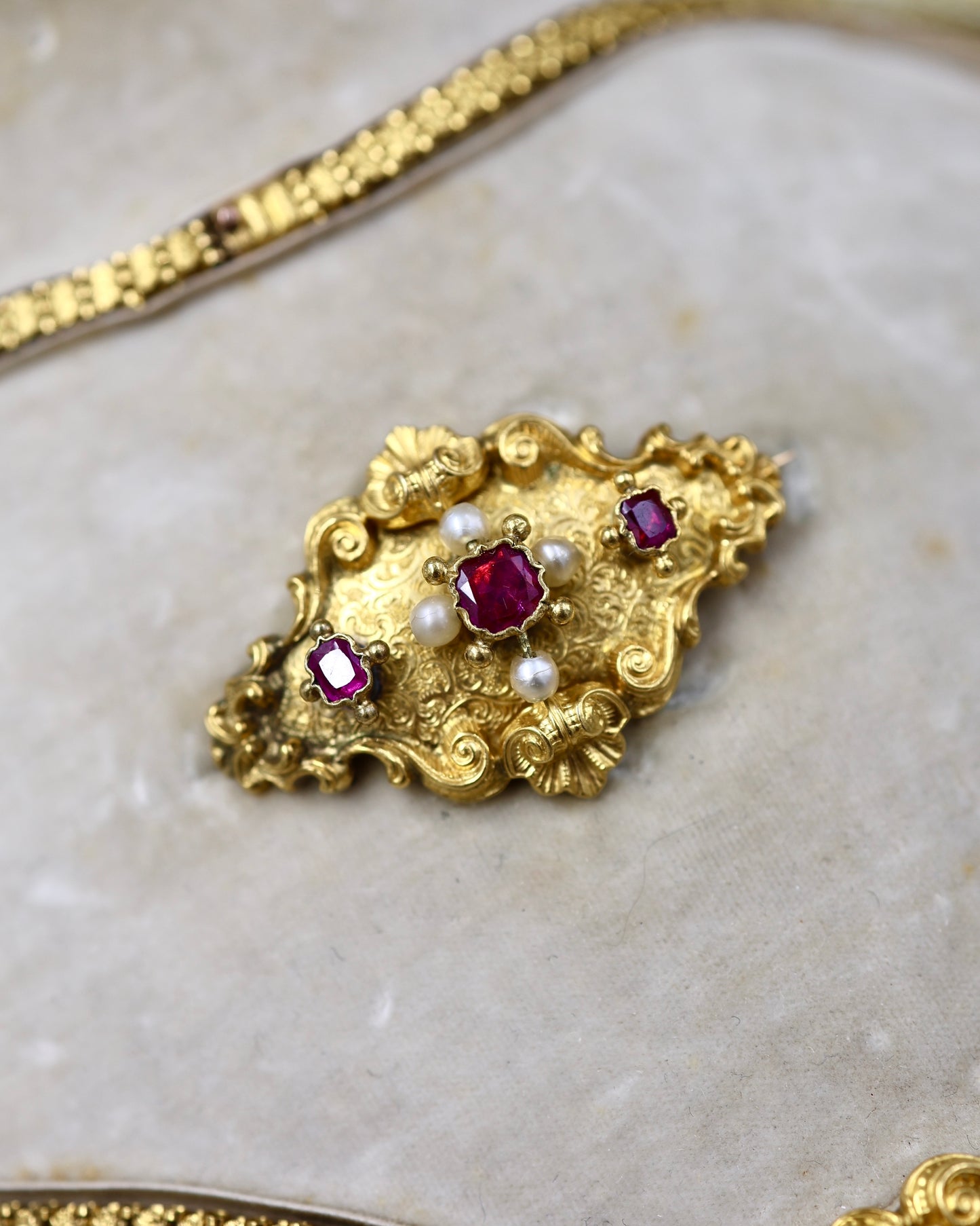 A Beautiful example of a very fine Antique 18ct Yellow Gold, Untreated Burmese Ruby and Seed Pearl, French Parure in the original box. Circa 1825