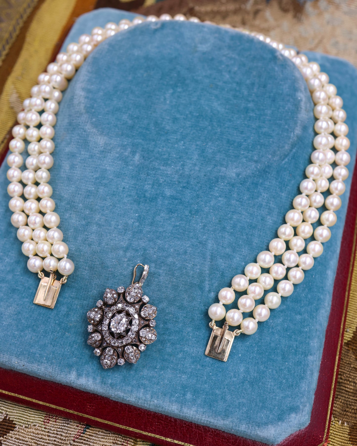 A very fine High Carat (tested), Yellow Gold, Silver tipped Oval Diamond Clasp, with double receipt fasteners for a triple row necklace of Cultured Pearls