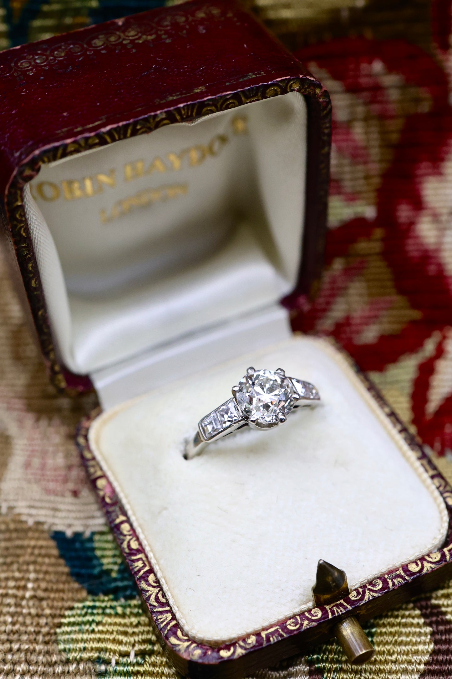 A very fine 1.60 Carat Old Cut Diamond & Platinum Solitaire Engagement Ring with French Cut Diamond Shoulders, English, Circa 1930