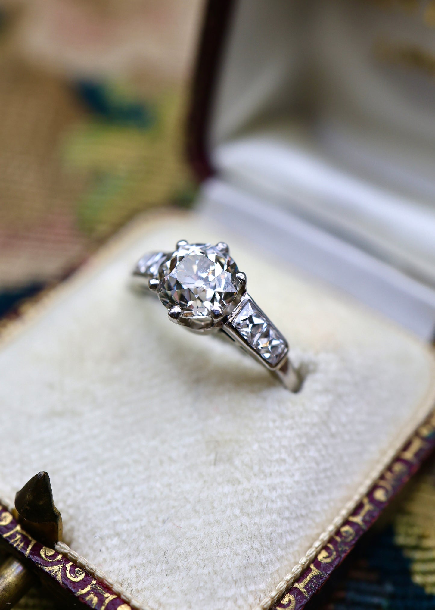 A very fine 1.60 Carat Old Cut Diamond & Platinum Solitaire Engagement Ring with French Cut Diamond Shoulders, English, Circa 1930