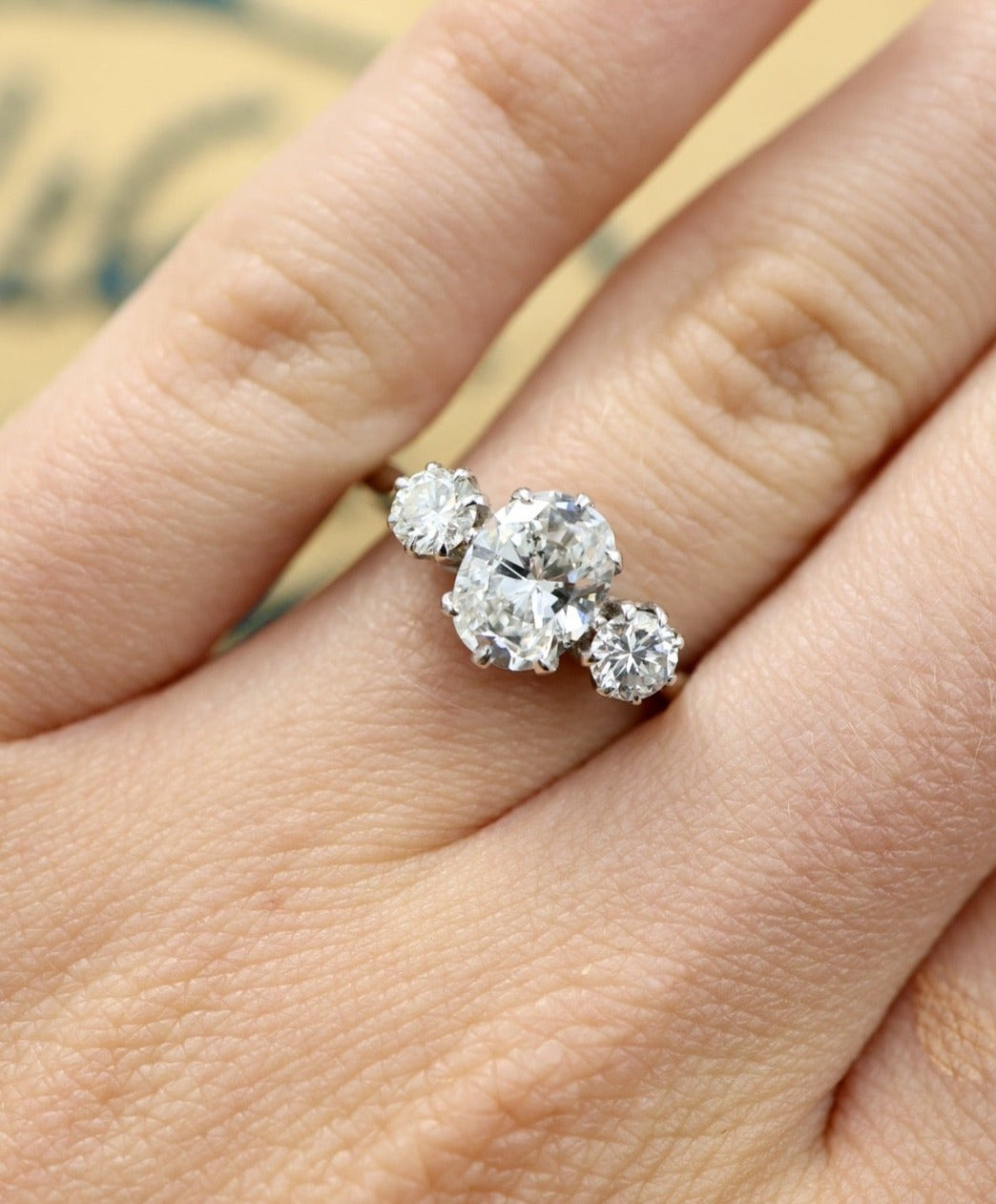 An exceptional 18ct White Gold (stamped) 1.30 Carat Three Stone Diamond Engagement Ring. Pre-owned