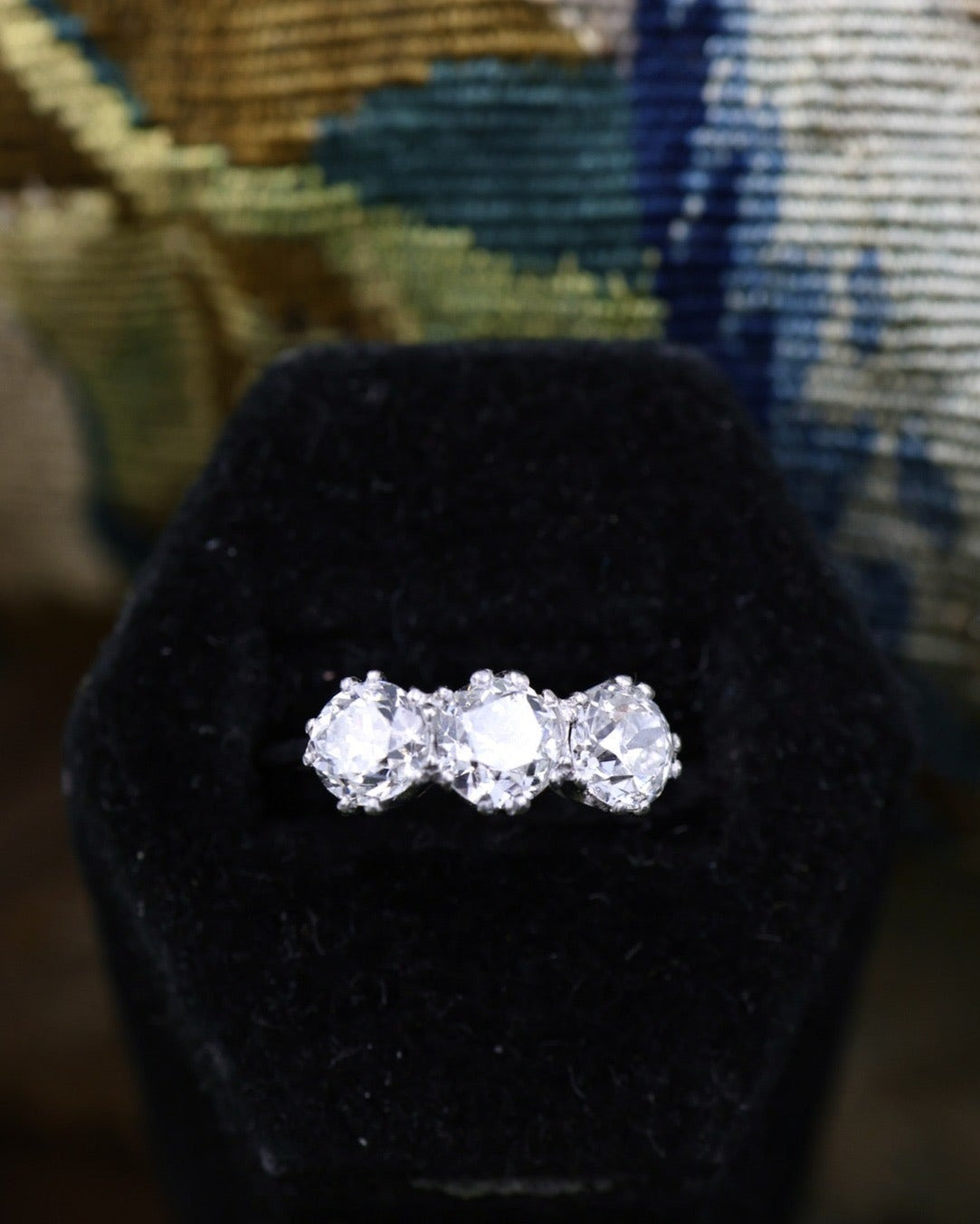 A very fine 18 carat White Gold (stamped), Three Stone Engagement Ring set with 2.25 Carats of Old Cut E - F Colour, VS Clarity Diamonds. Pre-owned.